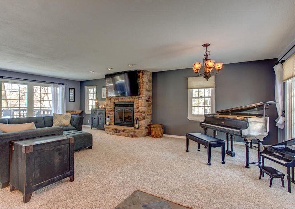 View of the living room with tons of natural sunlight