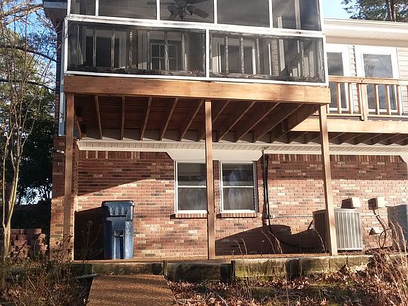 Back view from lake; 3 storyscreenedporch