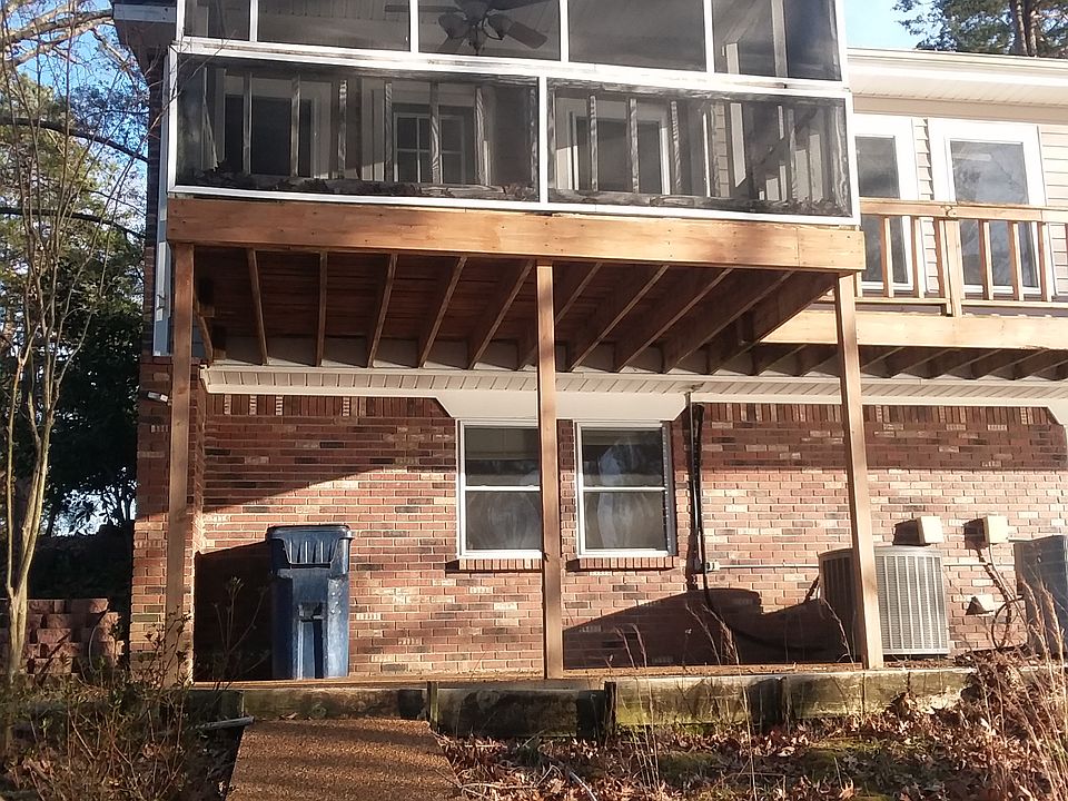 Back view from lake; 3 storyscreenedporch