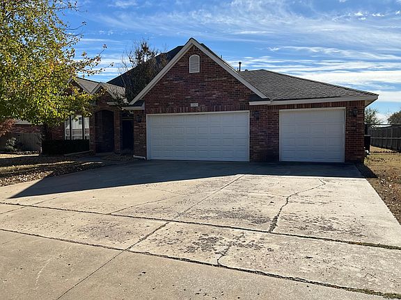 3 car garage_small garage extends beyond standard size