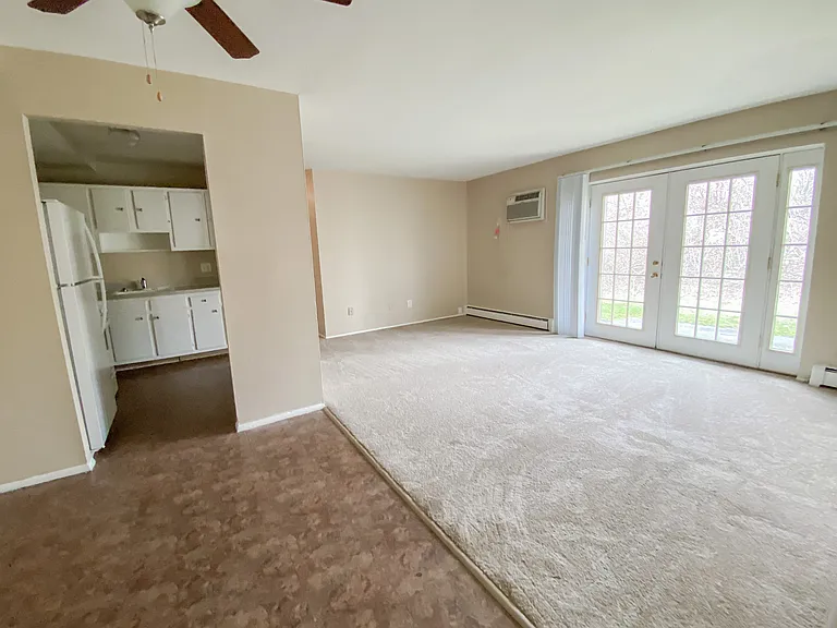 2 Bed Apartment - Dining, Kitchen, & Living Room