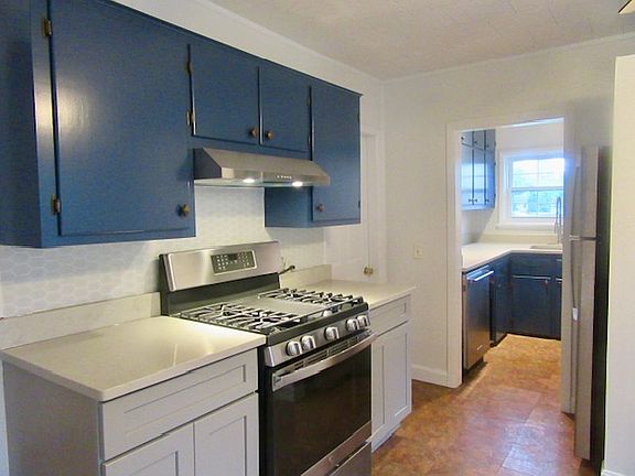 Kitchen - Updated cabinets & backsplash. Stainless steel appliances