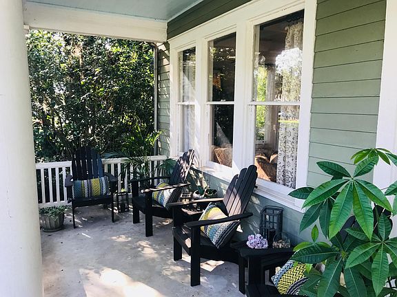 Porch adirondacks, tables, lanterns and pillows are included with rental.