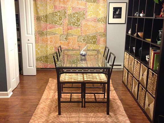 Dining room with closet. Includes storage shelves and new hot water heater.