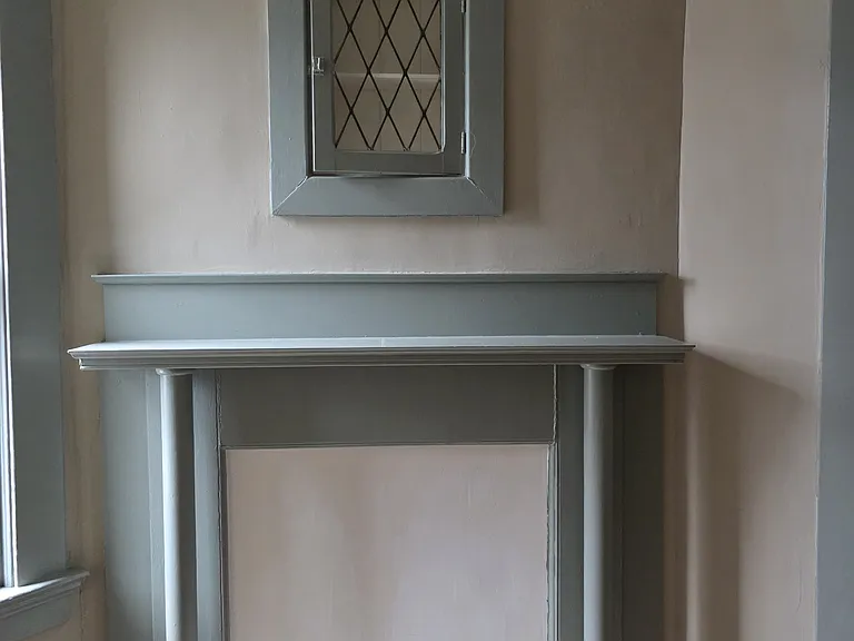 Mid-room fireplace.