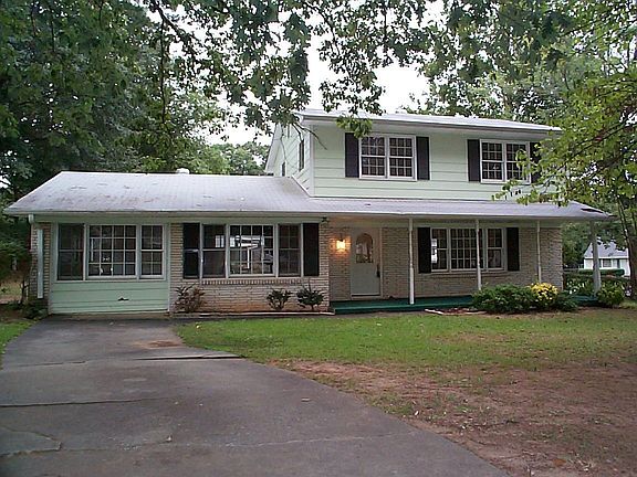 Another view of front with driveway