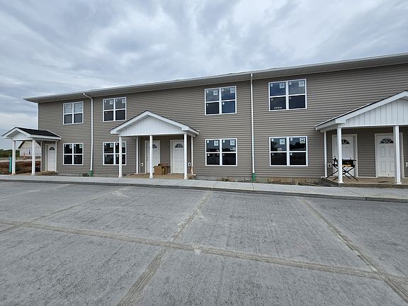 Exterior front of townhome building