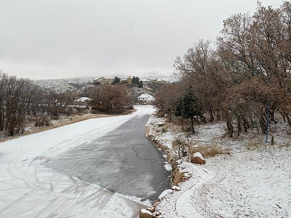 A view looking out the front door at the mountains.