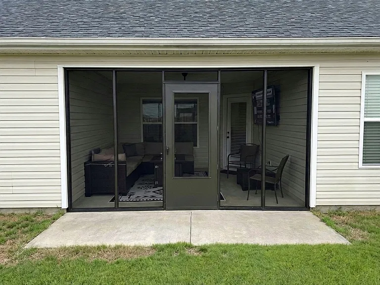 Screened in back patio.