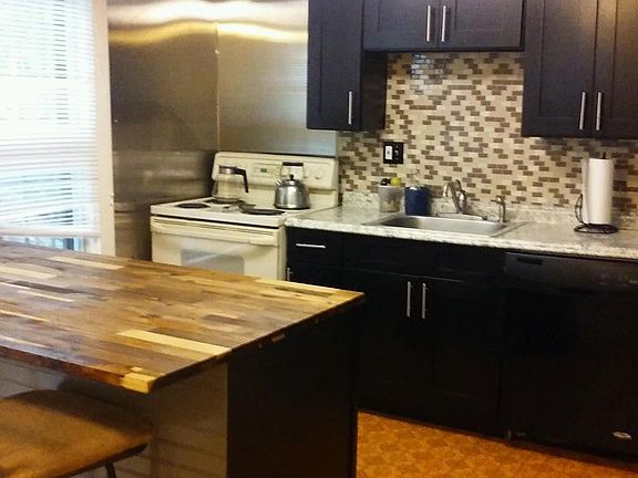 BUTCHER BLOCK ISLAND IN KITCHEN