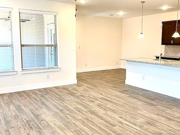 Open floorplan with modern interior finishes
