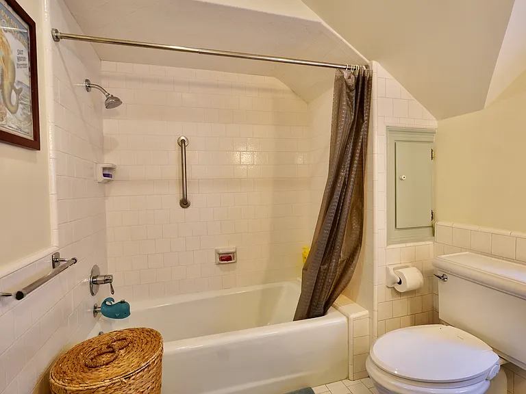 Upstairs bathroom with tub