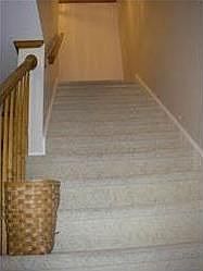 Wide stairs with vaulted ceiling