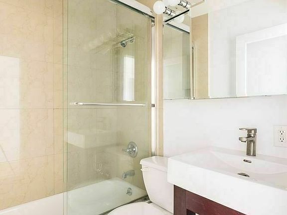 5th image of 249 E 10th St APT 9