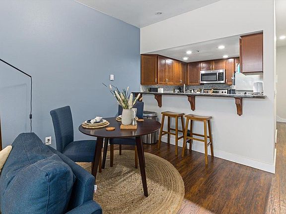 Room for 6 person dining table if needed.