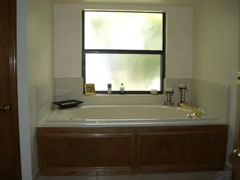 Master tub with separate shower. Two closets in master bath.