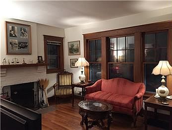 View of living room & fireplace. All furnishings are included