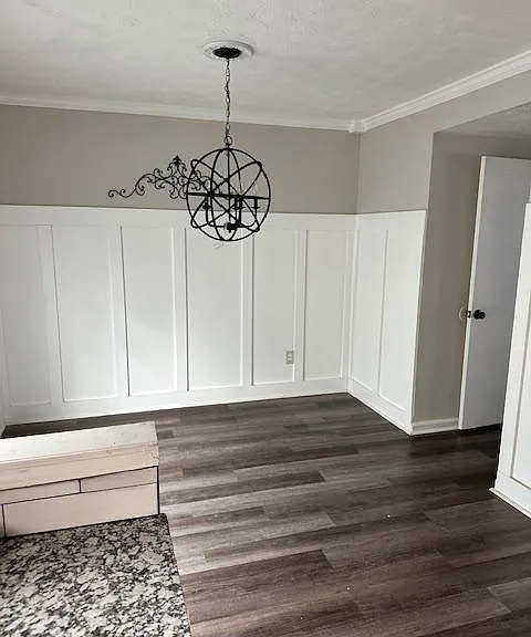 Large dining room with double doors leading to patio