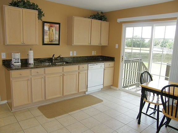 Lots of light in this kitchen, lots of cabinet & counter space