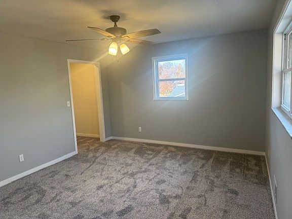 Master bedroom with opening to the closet.