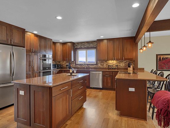 Fully furnished kitchen with double oven, microwave and all dishes and appliances