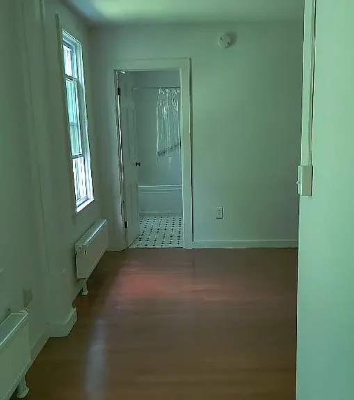downstairs bedroom with ensuite bathroom