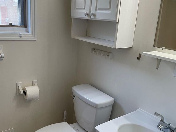 new bath flooring and toilet