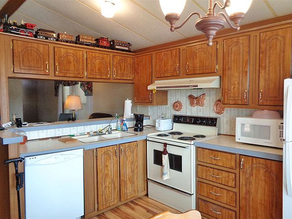 5th image of 11414 E 39th Pl