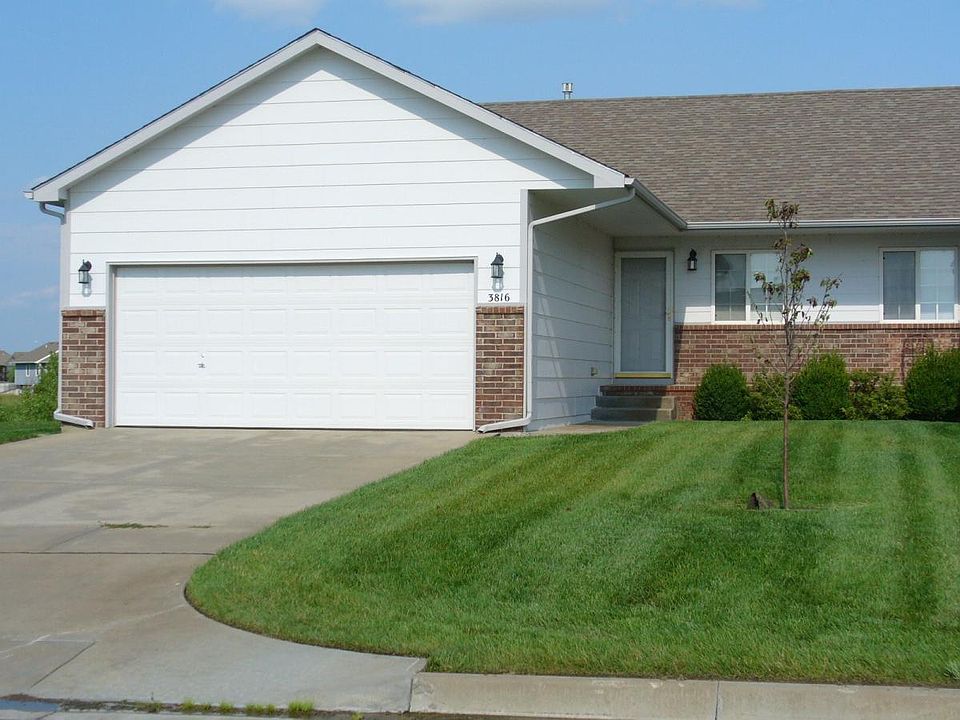 Street view of home - note full glass storm door.