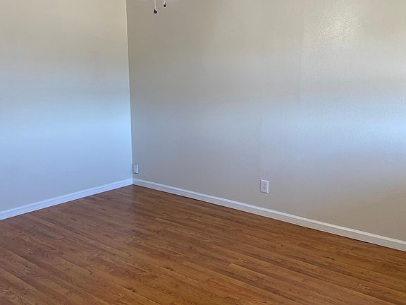 Nice and cozy living area. Calm neutrals to accommodate any style. New custom paint.