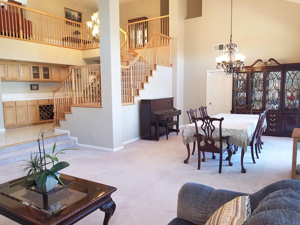 Living room and dining room and stairs to the 2nd floor.