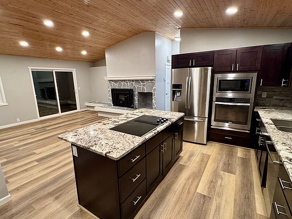 Dining Room & Kitchen- Pine T&G Ceiling-Granite tops- Wood Burning Fire Place w blower- New Cabinets