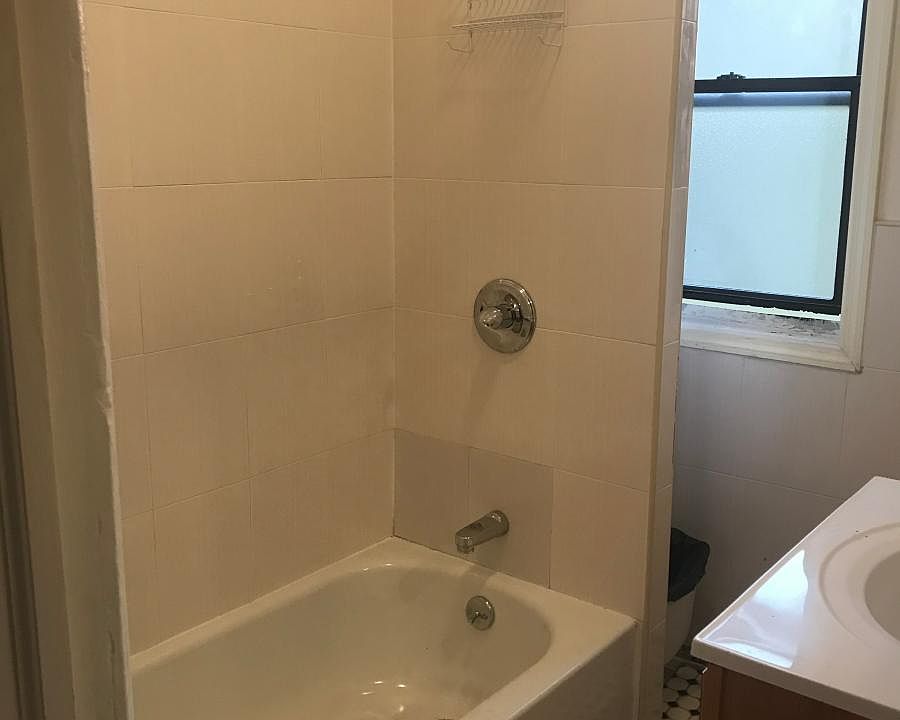 1st image of 3312 107th St Fl 2