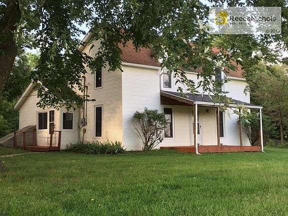 Who wouldn't want to spend time on this front porch!!!  Vinyl siding.