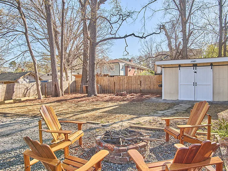 Fire pit and fully wired work shed with water and electric