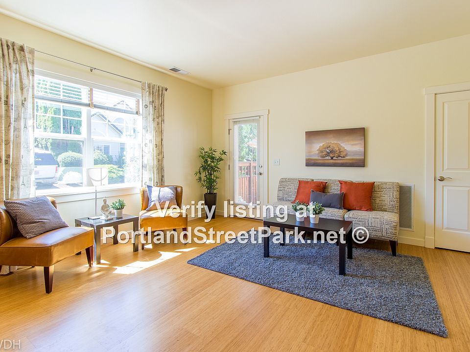 High ceilings, large windows, hardwood flooring