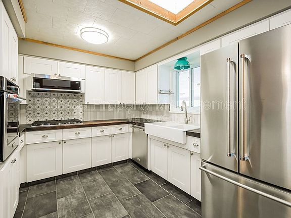 5th image of 7095 S Clermont Dr