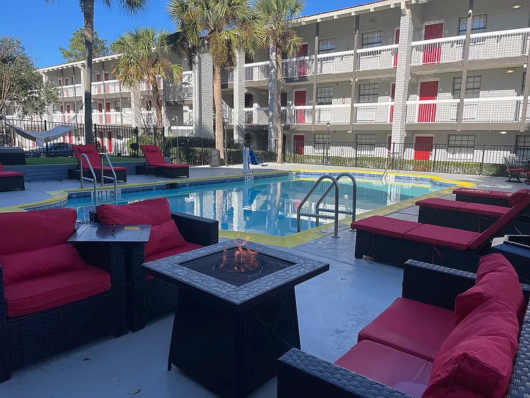 Relax and unwind in the tranquil poolside retreat, perfect for sunbathing or an evening by the fire.