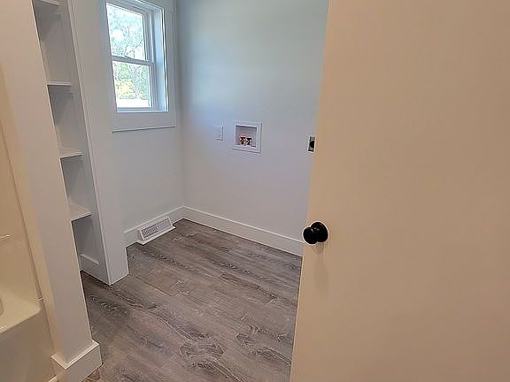 Laundry Room inside/ off of Bathroom