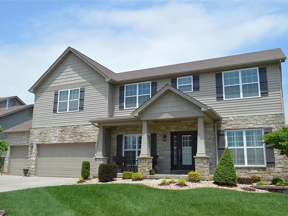 Stately exterior and maintenance free. Cool covered front porch with enough space for extra seating.