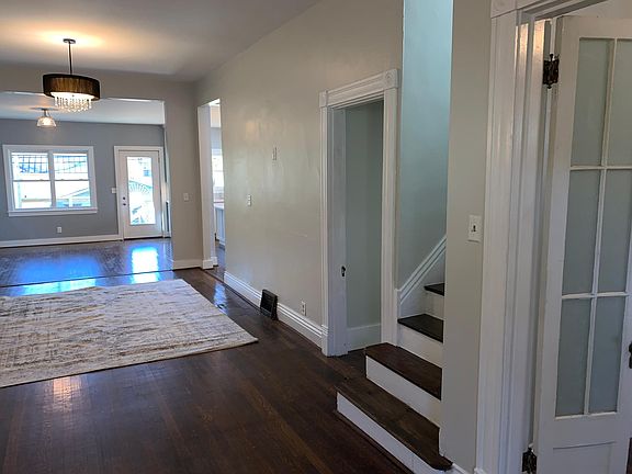 Hallway to bathroom and upstairs area.