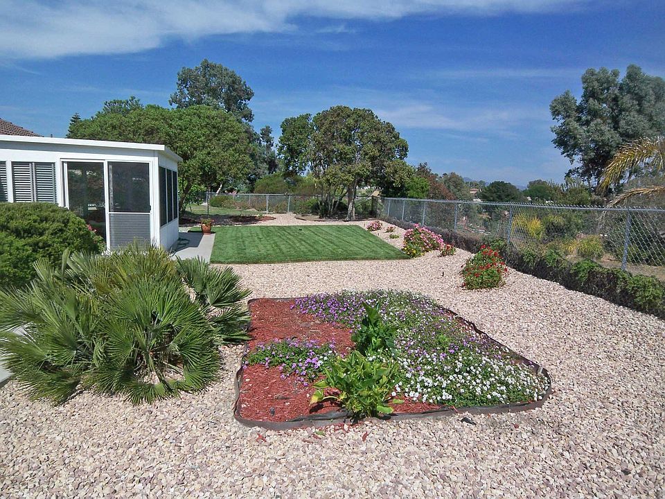 Large rear yard with room for garden, BBQ, and great western view