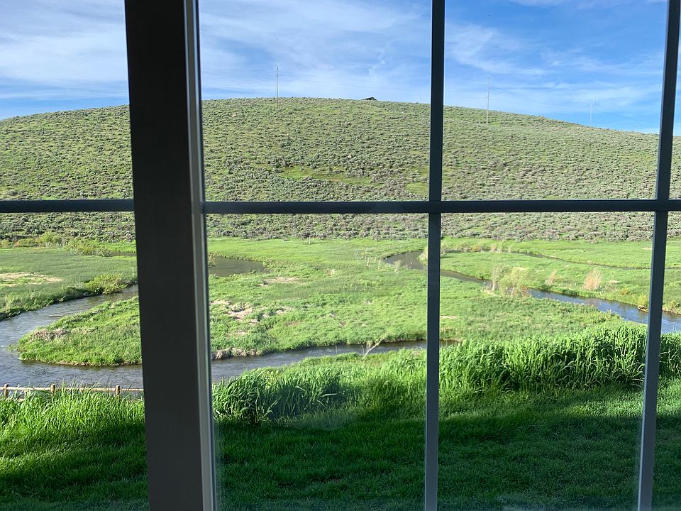 View out the Bedroom window of the Condo - Uncluttered Green Open Space with maximum privacy.