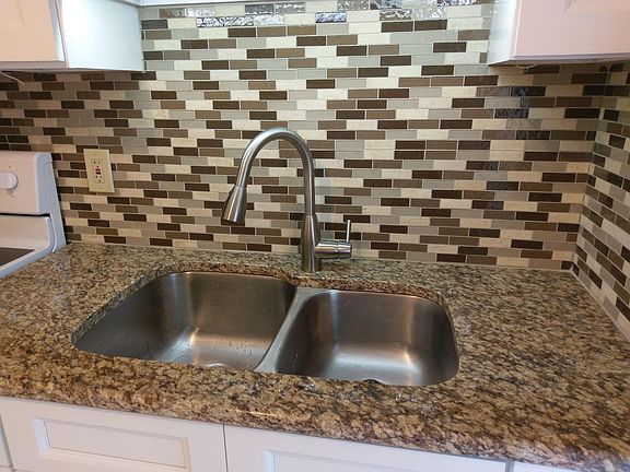 Double stainless steel kitchen sink.