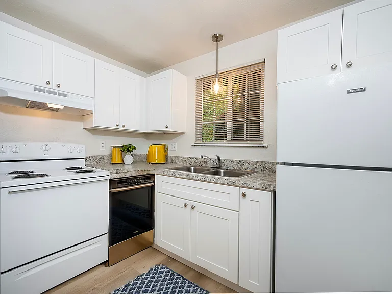 Embrace elegance in this bright kitchen space, perfect for culinary creativity.