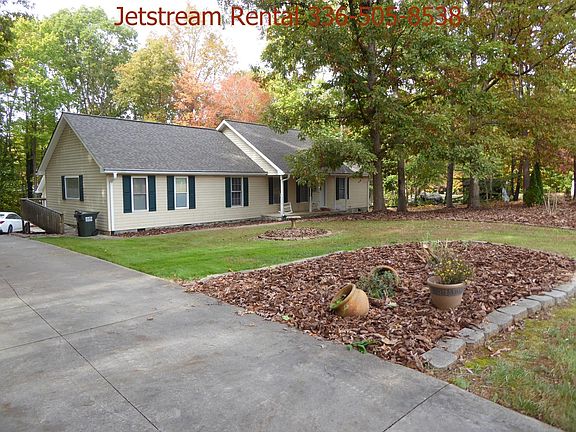 Side with concrete drive