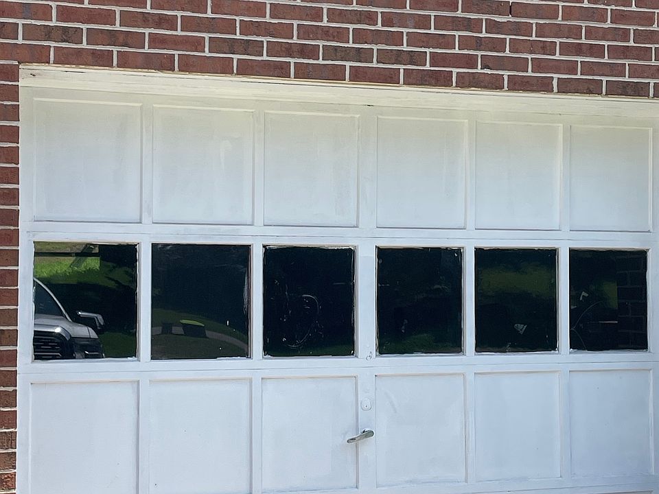 Garage with automatic door opener.