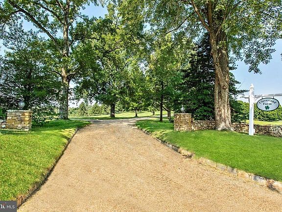 Estate entrance - long, gravel drive