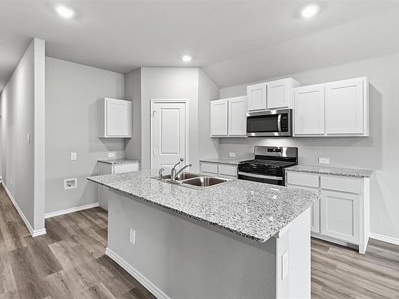 Kitchen-All Home and community information, including pricing, included features, terms, availability and amenities, are subject to change at any time without notice or obligation. All Drawings, pictures, photographs, video, square footages, floor plans, elevations, features, colors and sizes are approximate for illustration purposes only and will vary from the homes as built.