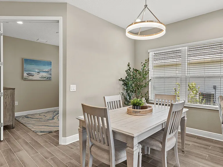 Dining Room and entry to home office complete with double glass French doors